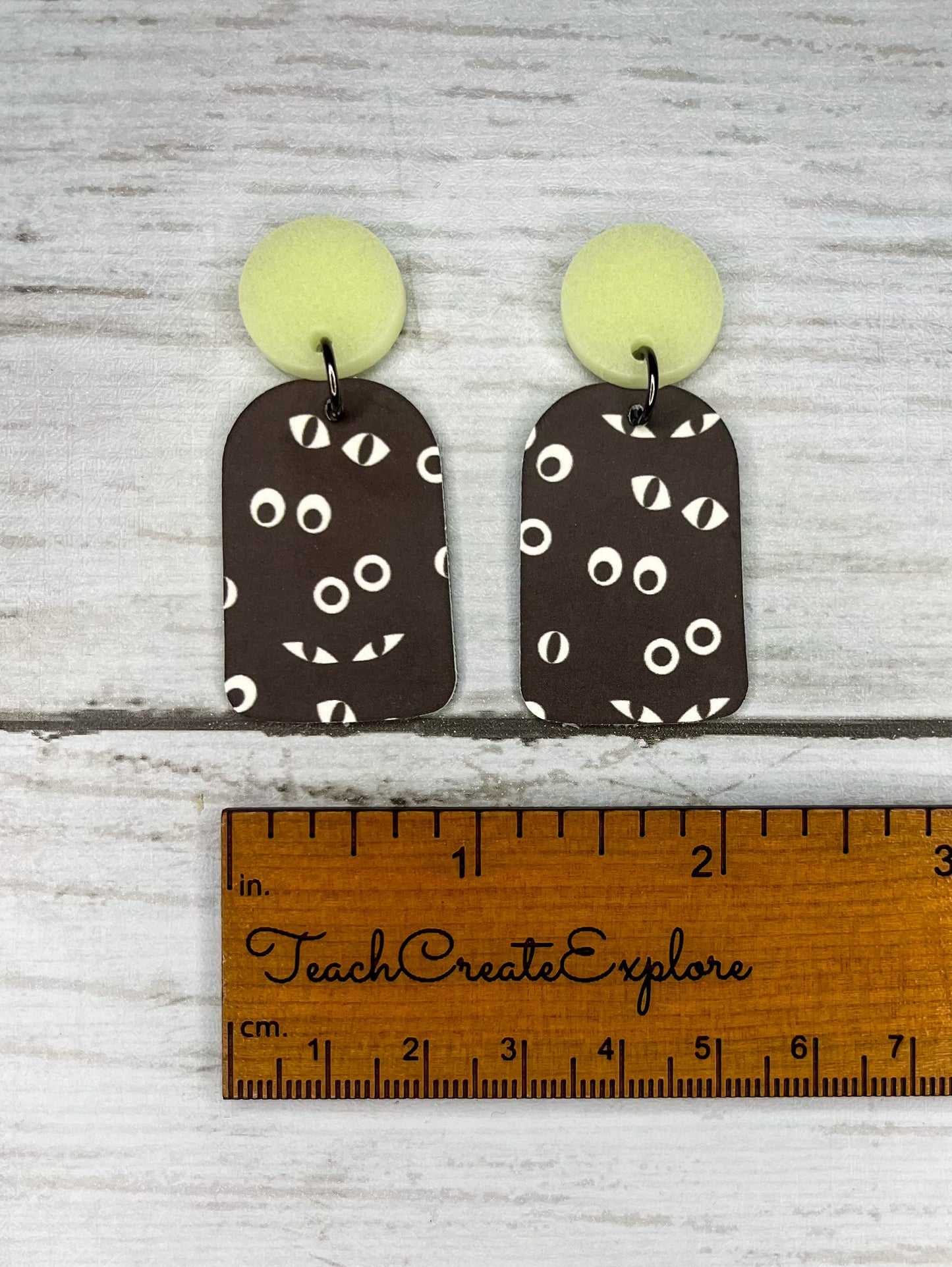 Somebody’s Watching Glow in the Dark Dangle Studs